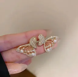 Elegant Pearl Butterfly Stud Earring