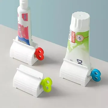 1 Pc Rolling Tube Toothpaste Squeezer