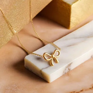 Knotted Ribbon Bow Pendent Necklace