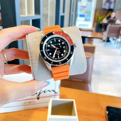 Michael Kors Maritime Three-Hand Black Dial Orange Silicone Strap Watch