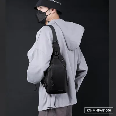 NOMAD CARRIER CHEST BAG