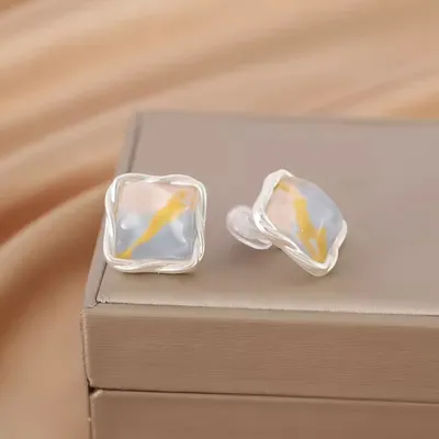 Elegant Glimmer Wave Design Stud Earrings