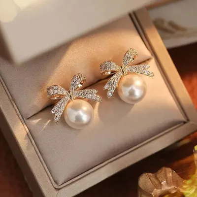 Trendy Wire Bow & Pearl Design Top Earrings