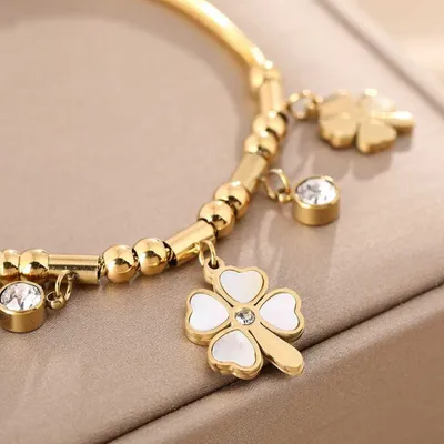 Trendy Gold Plated Heart Shaped Four Leaf Design Bracelet 