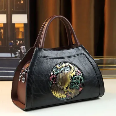 Stylish Carved Leather Dumpling Bag