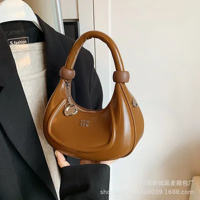 Hand-Held Armpit Bag