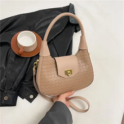 High texture portable crescent bag