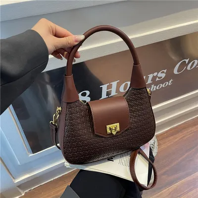 High texture portable crescent bag