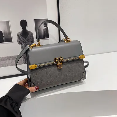 VERSATILE MULTI-USE HANDBAG